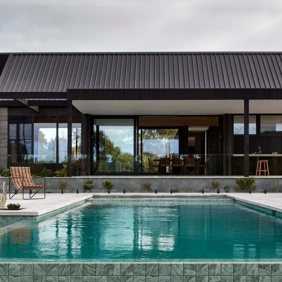 Century House: Precision framing within a rural coastal landscape